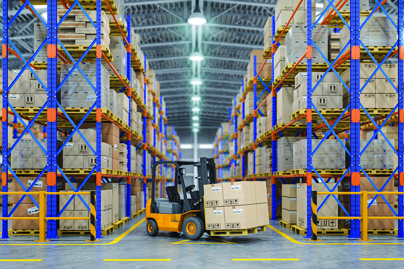 Forklift truck in warehouse or storage and shelves with cardboard boxes.
